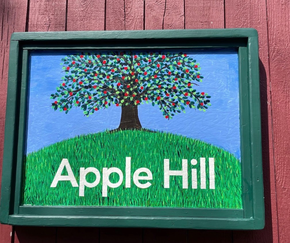 The hand-painted Apple Hill sign on the barn